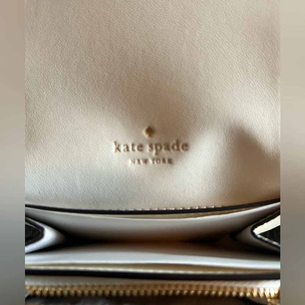 NWT- Kate Spade L- Zip White wallet. In wrapper.